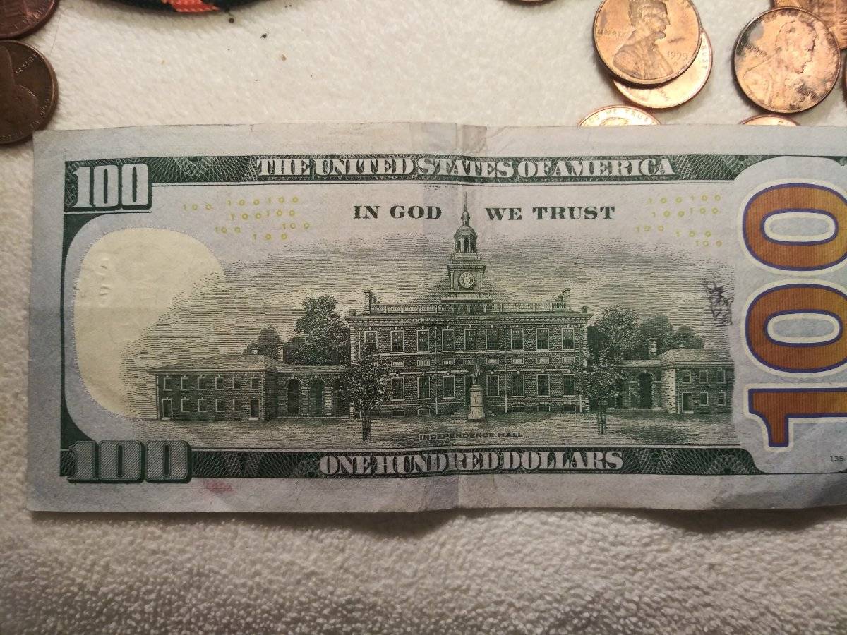 100-Dollar-Bill-With-Unique-Stamp-On-It